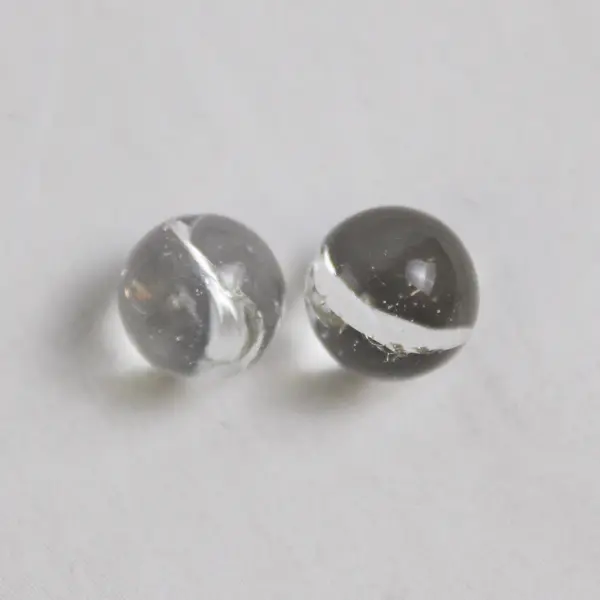 Lot Of 197 Unbranded Matching Glass Stones/Pebbles Clear Iridescent Sphere