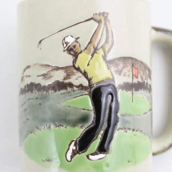 Tan Raised Relief Ceramic Golf Motif Coffee Mug