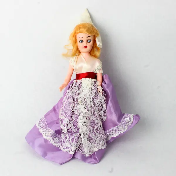 Vintage Dolls of the World Doll 7.5in Purple Dress Red Sash