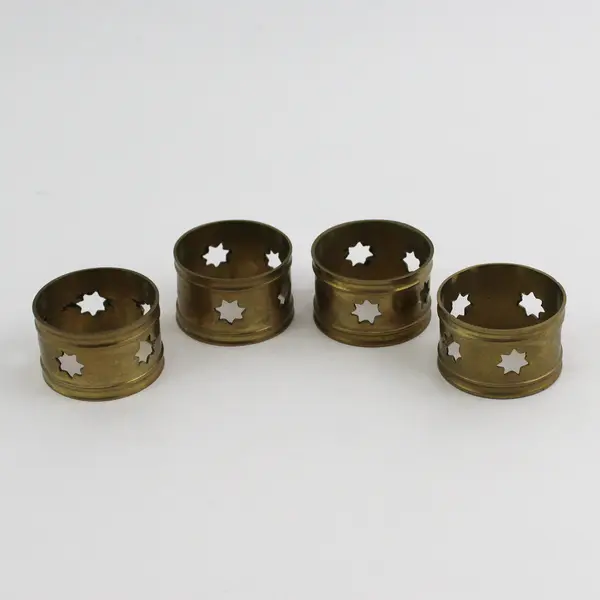 Set of 4 Brass Napkin Rings With Pierced Stars 1.75 Inch Diameter