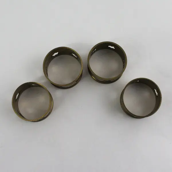 Set of 4 Brass Napkin Rings With Pierced Stars 1.75 Inch Diameter