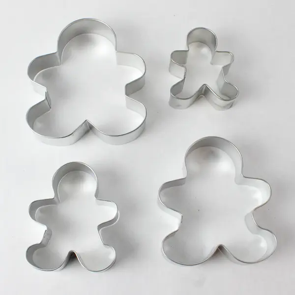 Set Of 4 Wilton Enterprise Metal Nesting Gingerbread Boy Cookie Cutter 2002