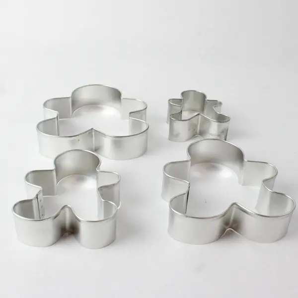Set Of 4 Wilton Enterprise Metal Nesting Gingerbread Boy Cookie Cutter 2002