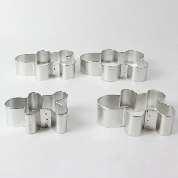 Set Of 4 Wilton Enterprise Metal Nesting Gingerbread Boy Cookie Cutter 2002