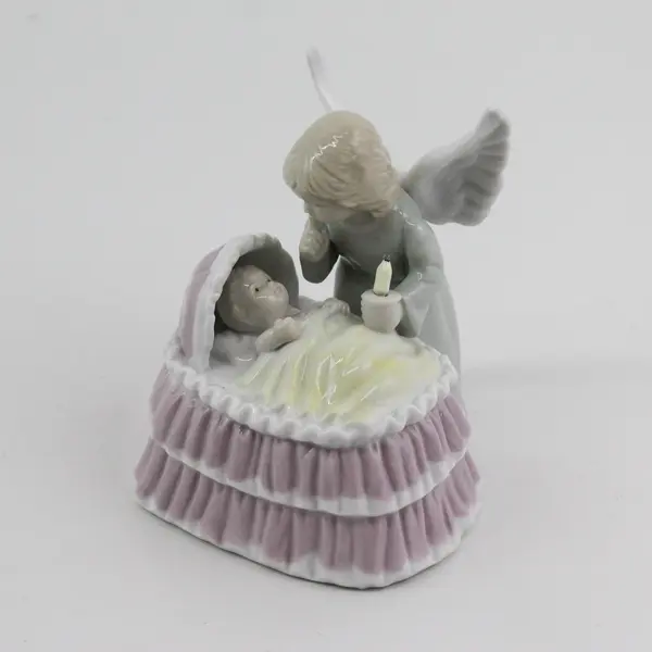 2000 Roman Inc. Ceramic Angel With A Lighted Candle With A Baby In A Bassinet