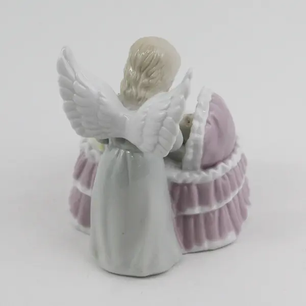 2000 Roman Inc. Ceramic Angel With A Lighted Candle With A Baby In A Bassinet