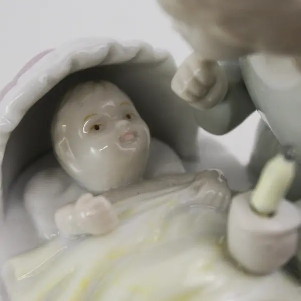 2000 Roman Inc. Ceramic Angel With A Lighted Candle With A Baby In A Bassinet