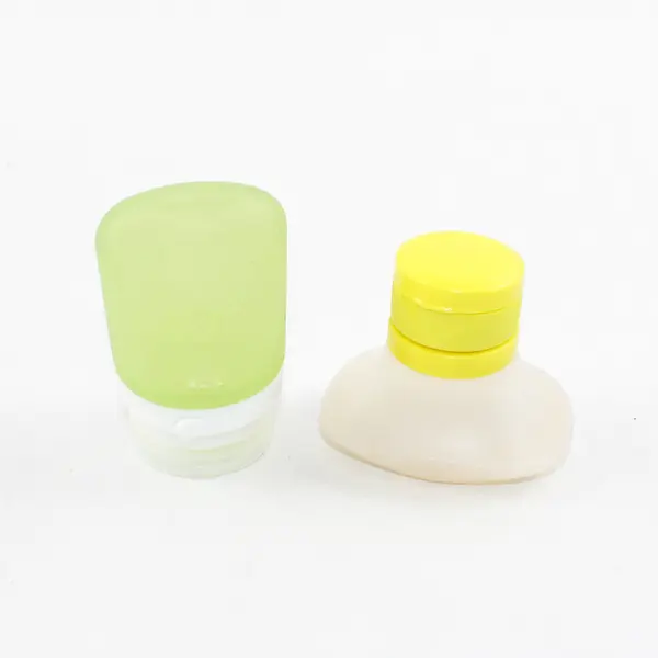 Lot of 2 Silicone Travel Bottles Reusable for Toiletries & Condiments