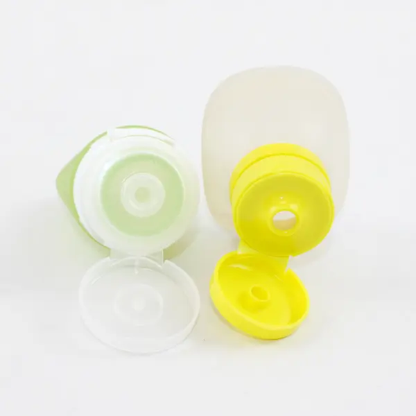 Lot of 2 Silicone Travel Bottles Reusable for Toiletries & Condiments