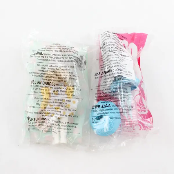 Lot of 2 McDonald's Toys Barbie Pink Shoes & Daisy Munchkin