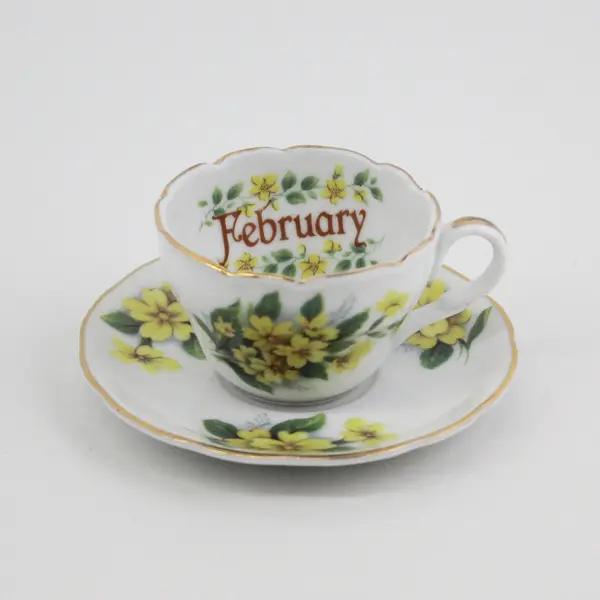 E &R Golden Crown Miniature February Yellow Violets Cup and Saucer Set