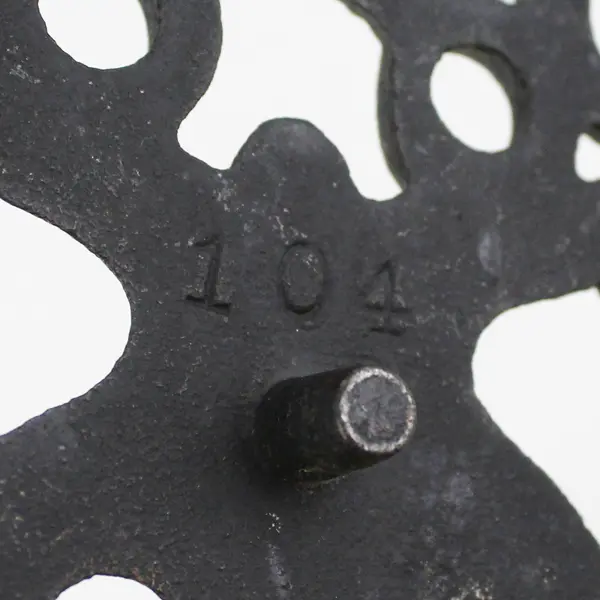 Vintage Scalloped Edge Cast Iron Folk Art Trivet 9" Marked 104