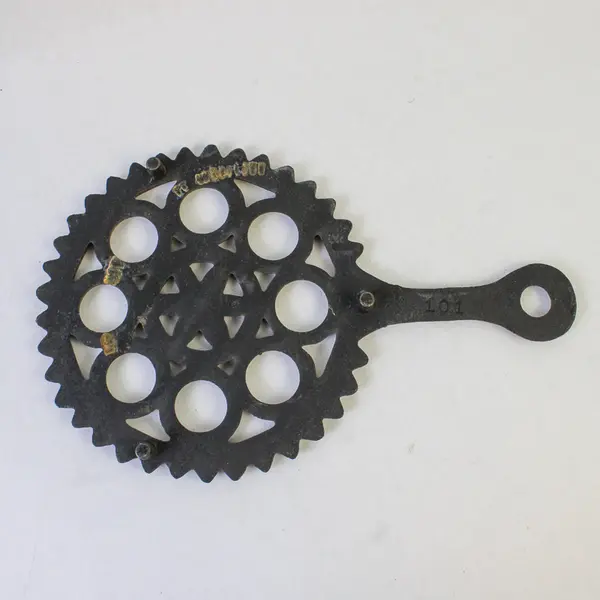 Vintage Saw Tooth Cast Iron Folk Art Trivet 8.5" Marked 101