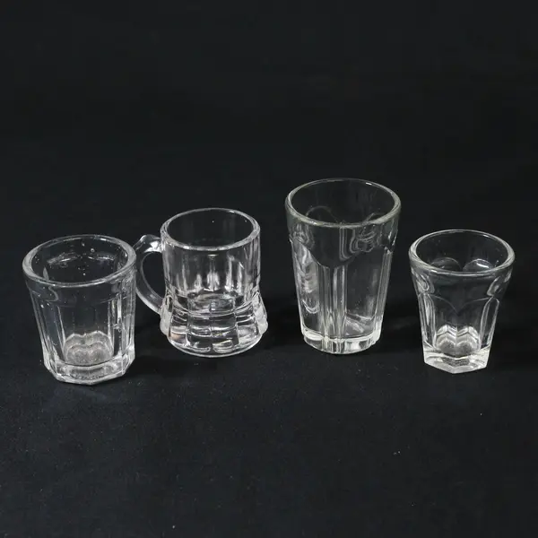 Lot Of 4 Unbranded/Unmarked Assorted Clear Glass Shot Glasses