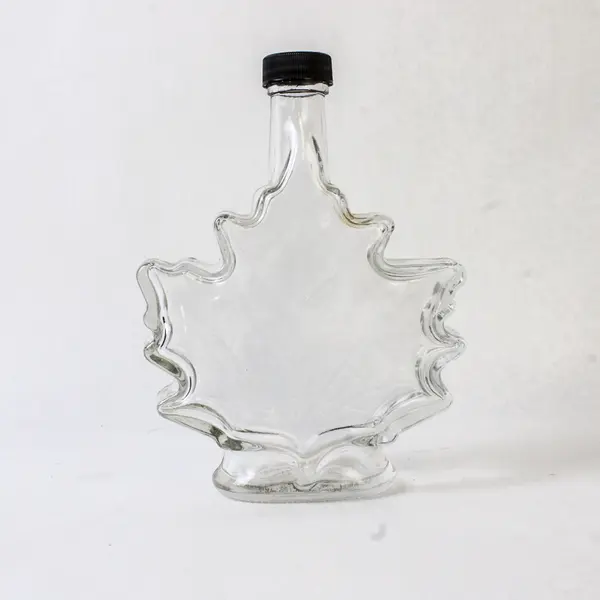 Lot of 2 Vintage Canadian Maple Leaf Glass Syrup Bottles Embossed Leaf