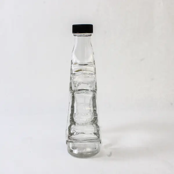 Lot of 2 Vintage Canadian Maple Leaf Glass Syrup Bottles Embossed Leaf