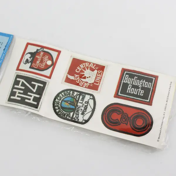 Sealed Pack of 20 Embossed Pressure-Sensitive Railroad Emblems 1978 - New