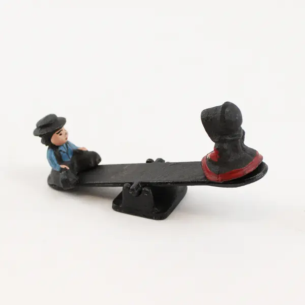 Vintage Cast Iron Amish Figurines Boy and Girl on Seesaw