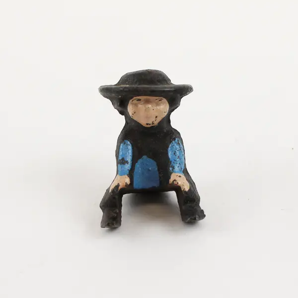 Vintage Cast Iron Amish Girl and Boy on Sled Figure