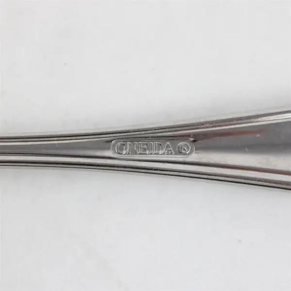 Lot of 2 Oneida New Rim Stainless Pierced Tablespoon & Serving Fork