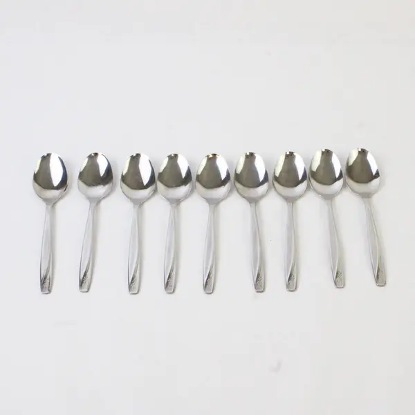 Set of 9 W.M.  Rogers & Son Stainless Steel Teaspoons Star Pattern