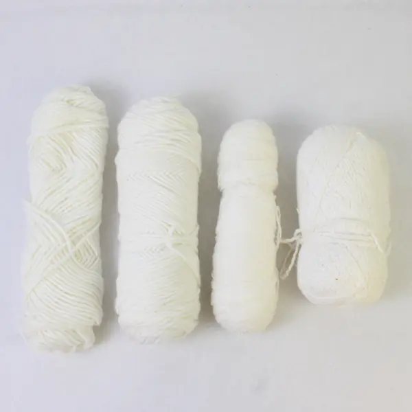 Lot of 4 Skeins of Assorted White Wool Yarn, Unbranded