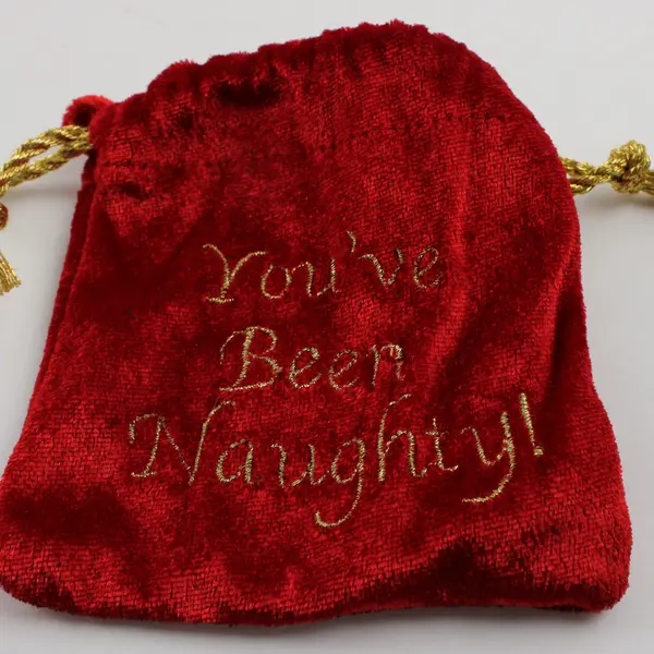 Unbranded "You've Been Naughty" Red Bag With 2 Resin Fake Coal