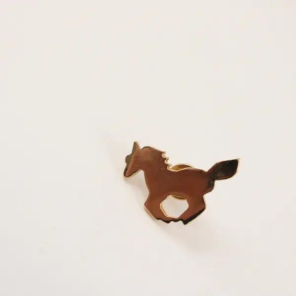 Vintage Sarah Coventry Gold-Tone Horse Lapel Pin