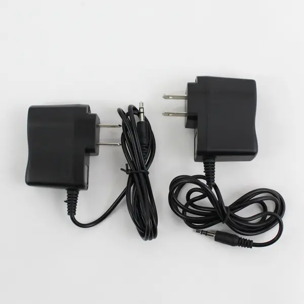Lot of 4 Electronic Accessories 2 AC/DC Power Adapters & 2 Earphones w/Mic