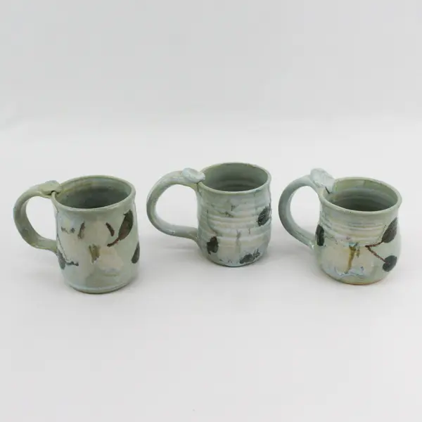 Handmade Leaf Pattern Ceramic Mugs From Laughing Cat Bend Oregon