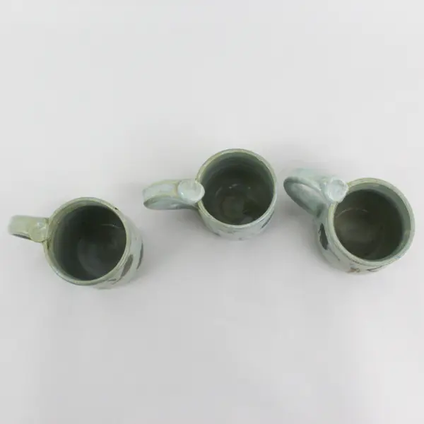 Handmade Leaf Pattern Ceramic Mugs From Laughing Cat Bend Oregon