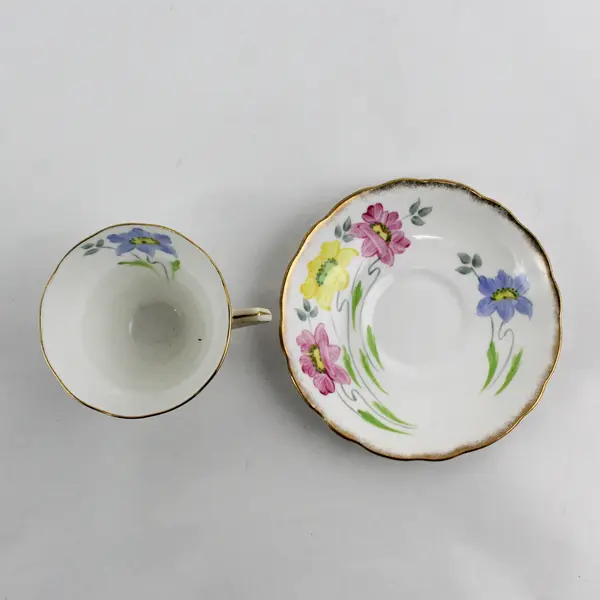 MCM Radfords Hand Painted Floral Footed  Bone China Cup And Saucer 