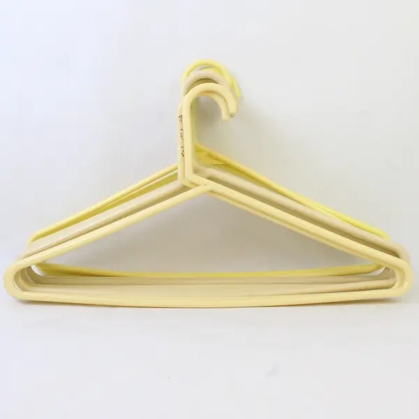 Mixed Lot of 10 Beige and Yellow Plastic Clothes Hangers