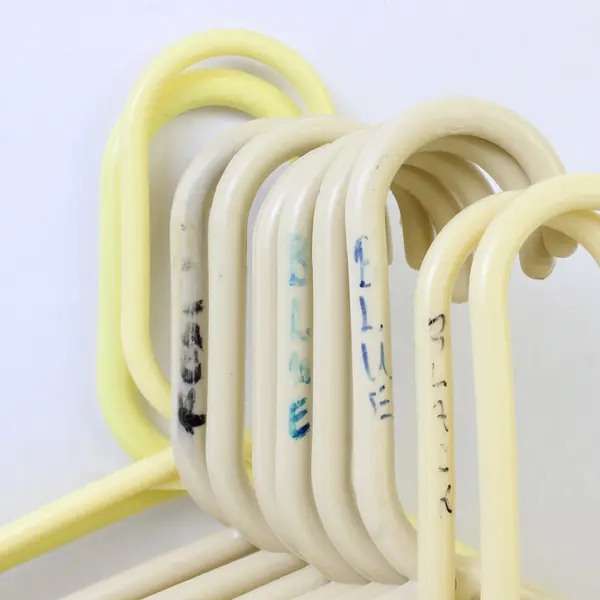 Mixed Lot of 10 Beige and Yellow Plastic Clothes Hangers