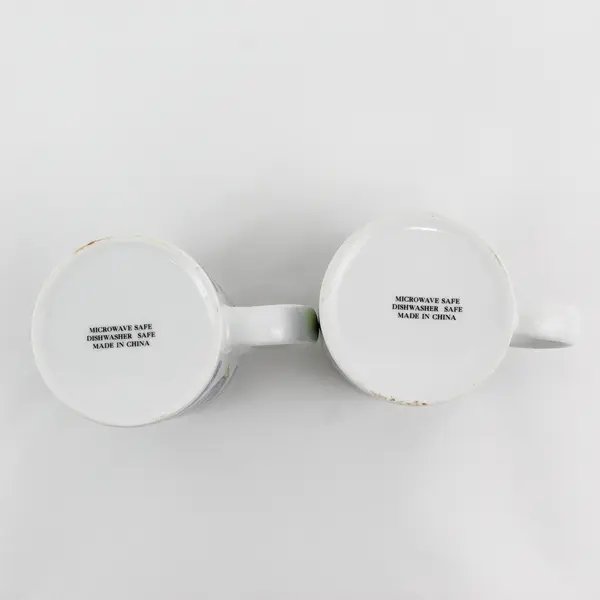 Lot of 2 Easter Themed Ceramic Mugs Featuring Colorful Decorated Eggs