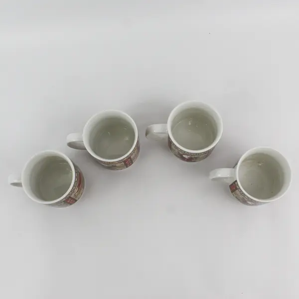 Lot Of 4 Sakura Brand Magic Of Santa Pattern Ceramic Coffee/Tea Mugs 3.75" Tall