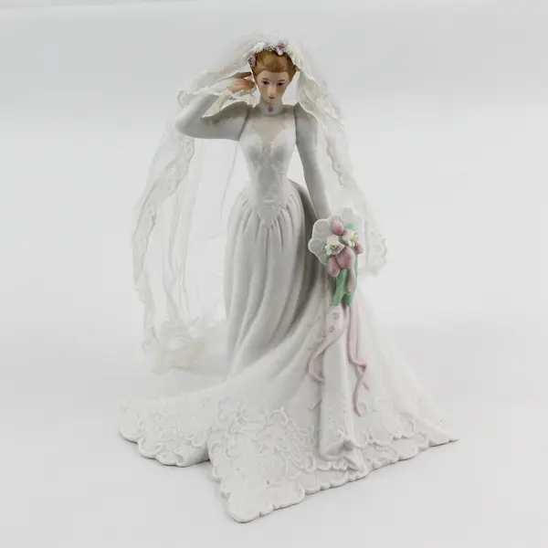 1987 Enesco Saluting Bride By G.G. Santiago