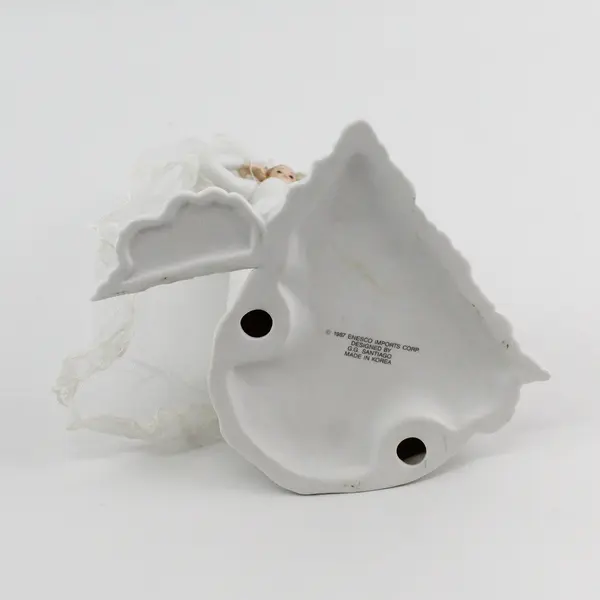 1987 Enesco Saluting Bride By G.G. Santiago