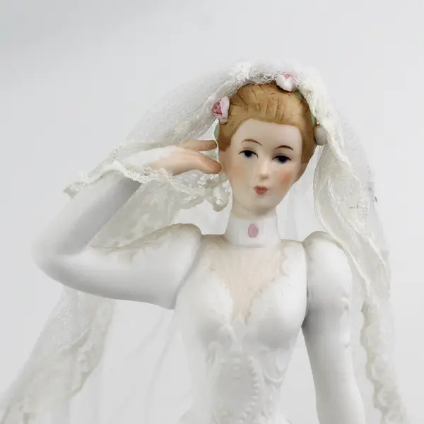 1987 Enesco Saluting Bride By G.G. Santiago