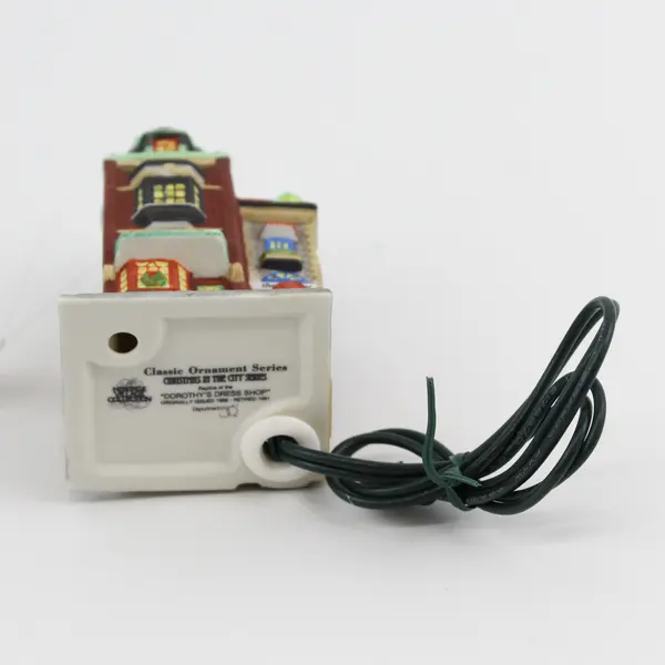 1998 Dept 56  Christmas In The City Ornament Lighted Dorothy's Dress Shop 98770