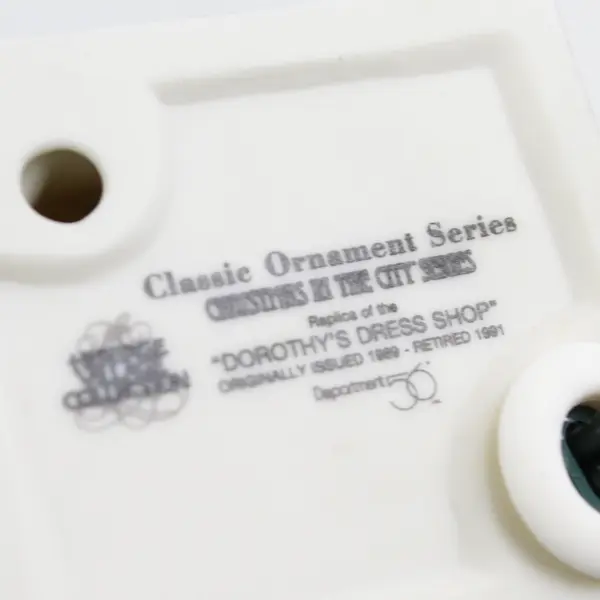 1998 Dept 56  Christmas In The City Ornament Lighted Dorothy's Dress Shop 98770