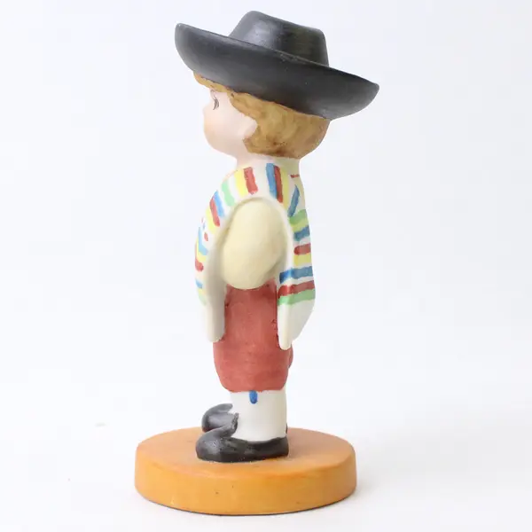 Porcelain Figurine Young Boy Traditional Attire Collectible 4.25in