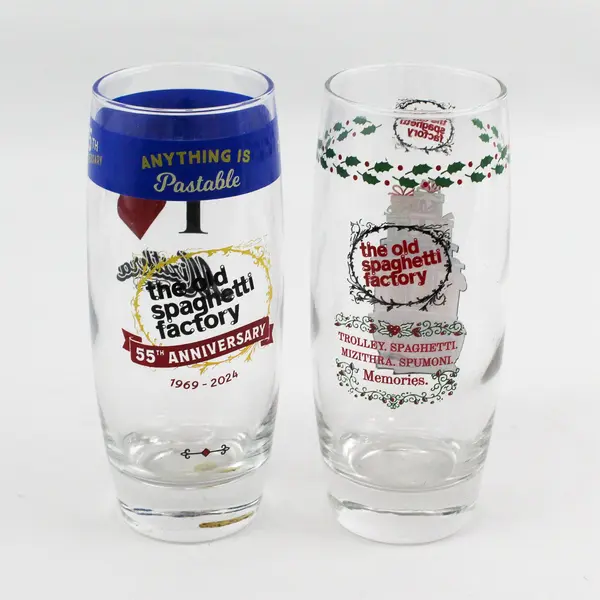 Lot of 2 Old Spaghetti Factory Glasses 55th Anniversary and Trolley