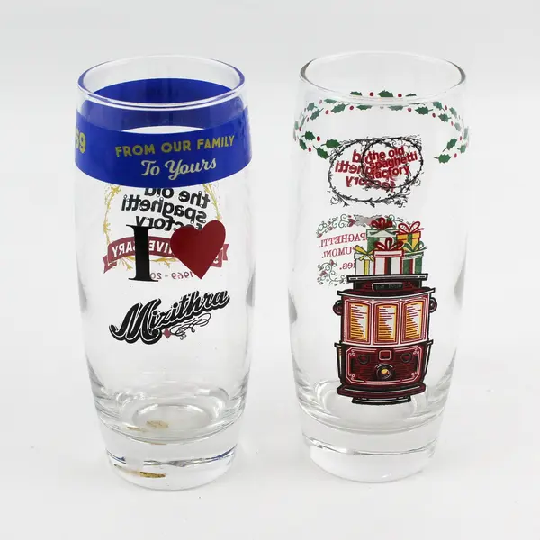 Lot of 2 Old Spaghetti Factory Glasses 55th Anniversary and Trolley