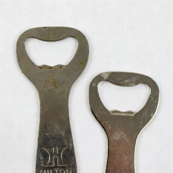 Set of 2 Vintage Hilton Hotels Metal Bottle Openers - Breweriana