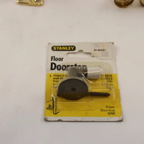 Lot of 8 Assorted Doorstops 6x5x2in Used