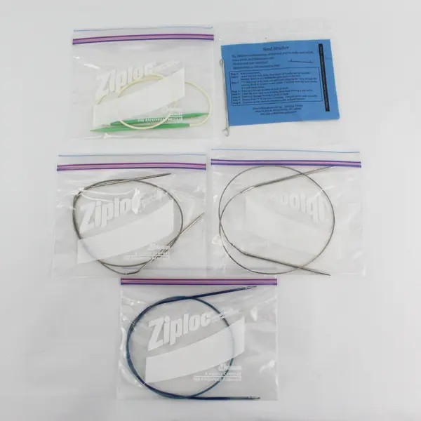 Lot of 4 Circular Knitting Needles And A Seed Stitcher