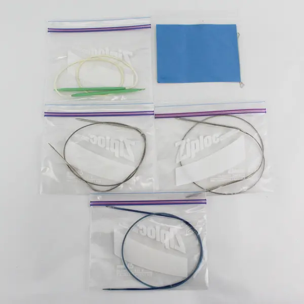 Lot of 4 Circular Knitting Needles And A Seed Stitcher