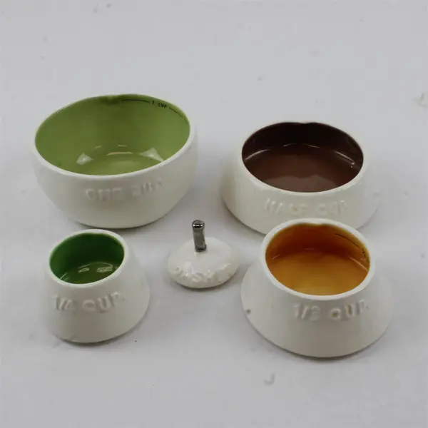 Magenta Rae Dunn Ceramic Pear Shaped 4 Piece Stacking Measuring Cup Set 