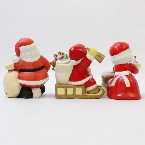 Lot of 3 Christmas Ceramic Figurines Santa Mrs Claus Sled Cake